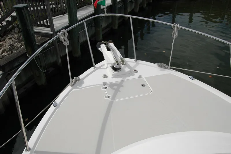 Au Lapin Agile Yacht Photos Pics Bow of 2014 Back Cove 34 boat with railing and anchor system.