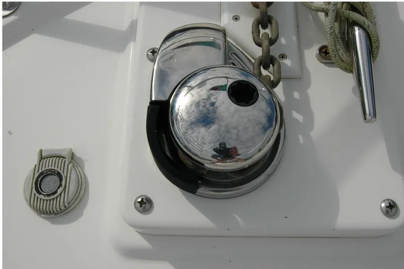 Au Lapin Agile Yacht Photos Pics Chrome winch and chain on 2014 Back Cove 34 boat deck.