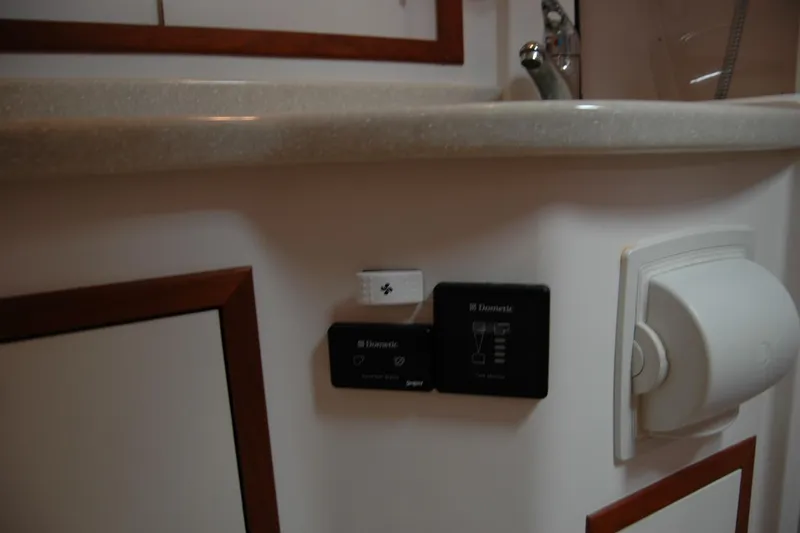 Au Lapin Agile Yacht Photos Pics Control panel and outlet in 2014 Back Cove 34 boat interior.