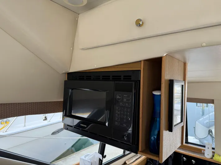  Yacht Photos Pics Microwave in 2001 Bayliner 3988 Command Bridge Motoryacht kitchen area.
