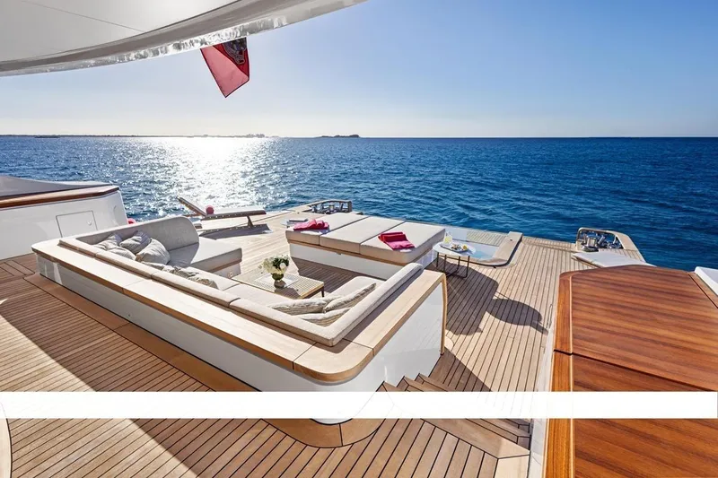  Yacht Photos Pics Luxurious 2024 Benetti Oasis 40 yacht deck with ocean view and elegant seating.