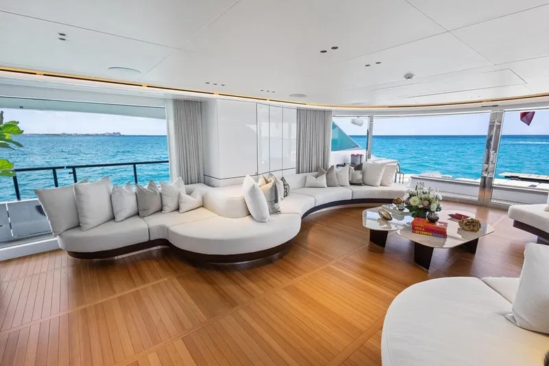  Yacht Photos Pics Luxurious interior of 2024 Benetti Oasis 40 yacht with ocean view and elegant seating.