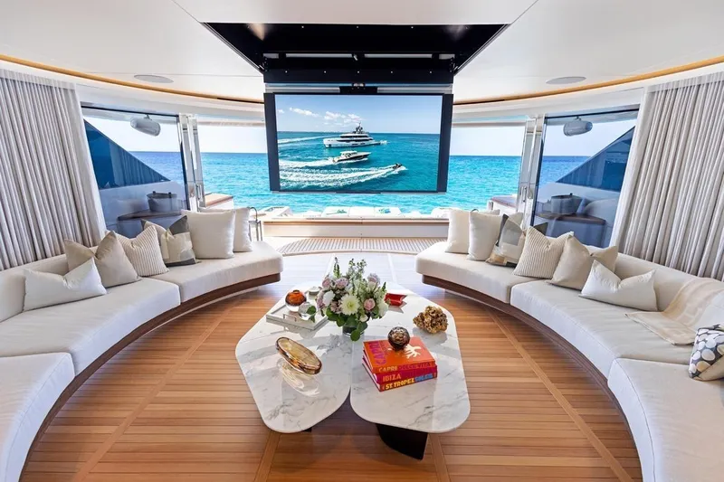  Yacht Photos Pics Luxurious interior of 2024 Benetti Oasis 40 yacht with ocean view and elegant seating.