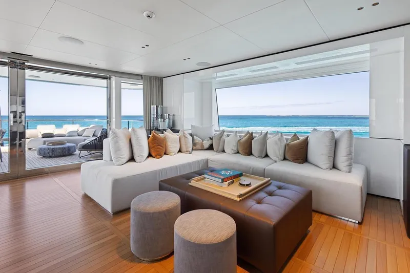  Yacht Photos Pics Luxurious interior of 2024 Benetti Oasis 40 yacht with ocean view and elegant seating.