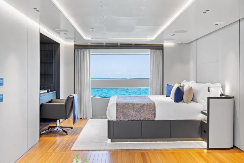  Yacht Photos Pics Luxurious bedroom interior on 2024 Benetti Oasis 40 yacht with ocean view.
