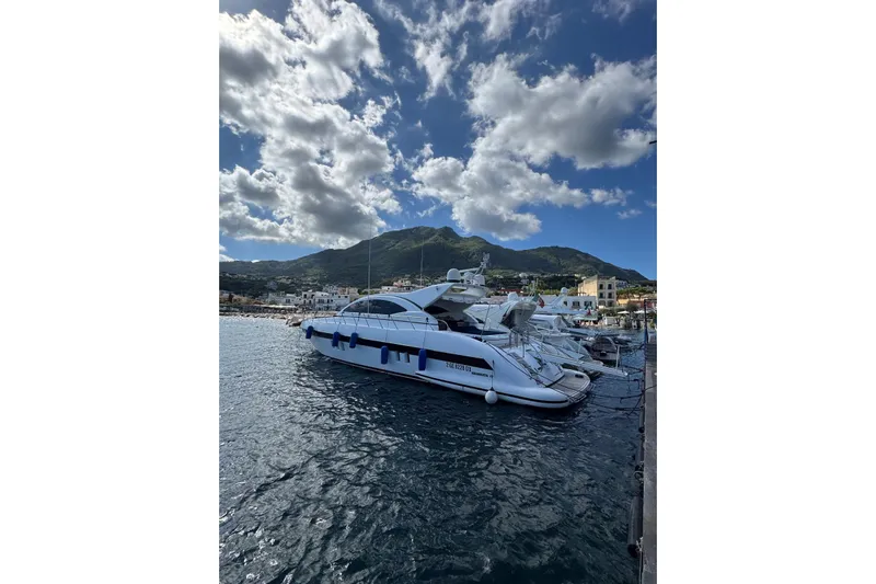  Yacht Photos Pics Luxury Overmarine Mangusta 72 HT yacht docked in scenic marina, 2009 model.