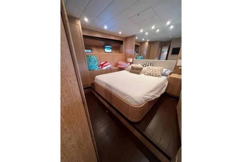  Yacht Photos Pics Luxurious bedroom interior of 2009 Overmarine Mangusta 72 HT yacht with modern design.