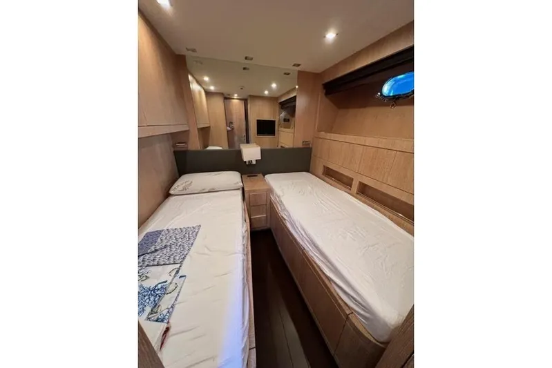  Yacht Photos Pics Luxurious twin cabin interior of 2009 Overmarine Mangusta 72 HT yacht.