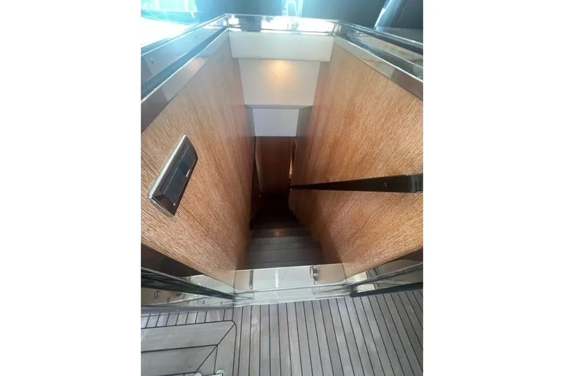 Yacht Photos Pics Staircase leading below deck on 2009 Overmarine Mangusta 72 HT yacht.