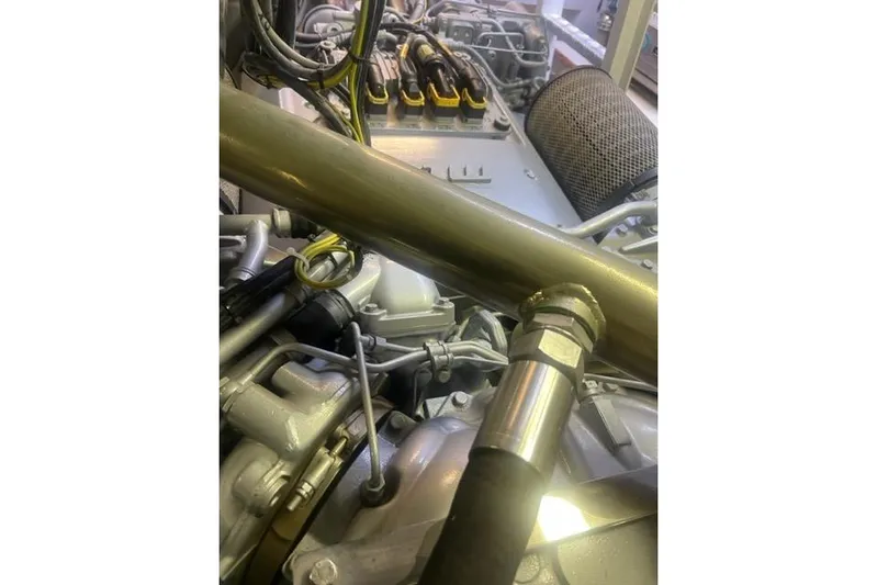  Yacht Photos Pics Engine components of a 2009 Overmarine Mangusta 72 HT yacht, showcasing intricate mechanical details.