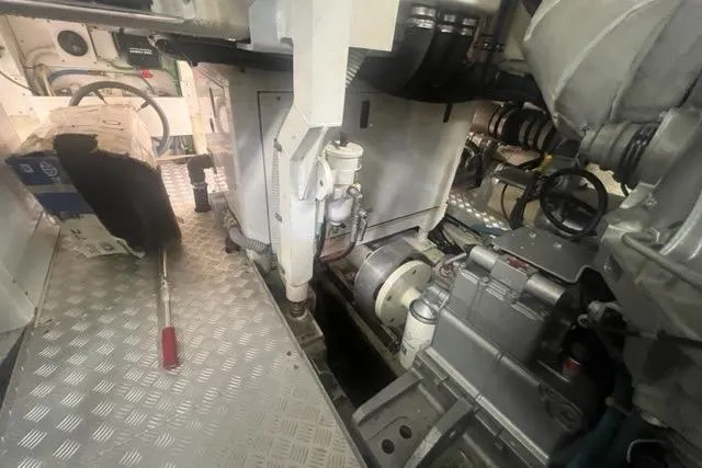  Yacht Photos Pics Engine room of 2009 Overmarine Mangusta 72 HT yacht, showcasing mechanical components and equipment.