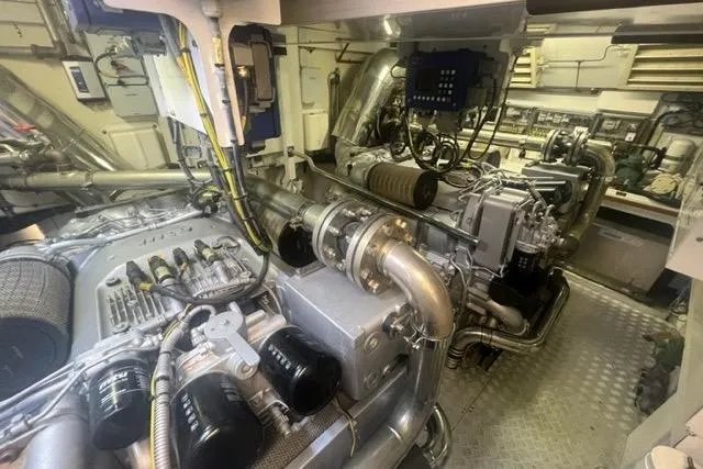  Yacht Photos Pics Engine room of 2009 Overmarine Mangusta 72 HT yacht, showcasing complex machinery and components.
