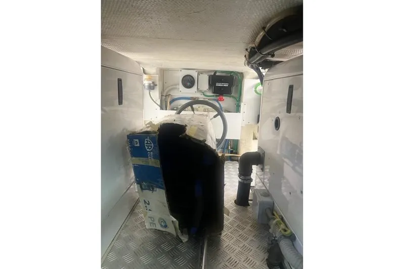  Yacht Photos Pics Engine room of 2009 Overmarine Mangusta 72 HT yacht, featuring equipment and wiring.