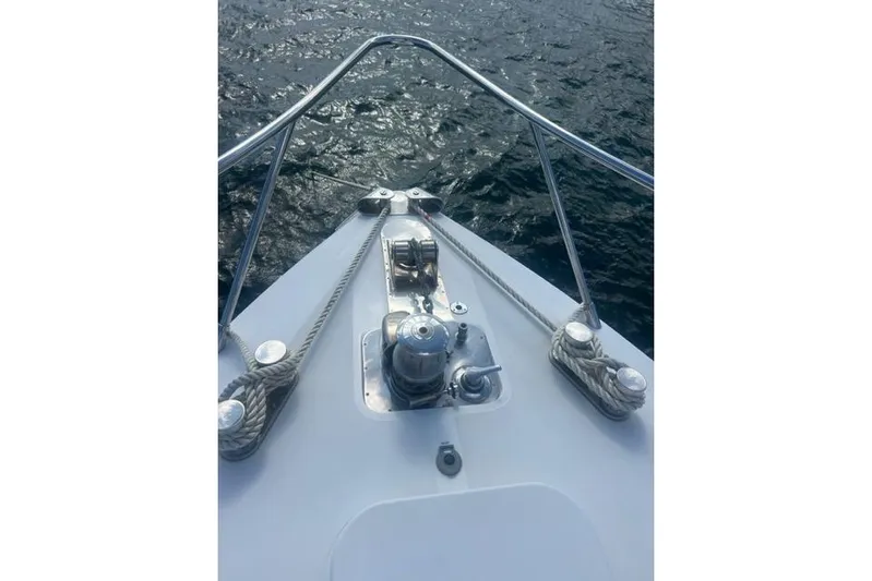  Yacht Photos Pics Bow of 2009 Overmarine Mangusta 72 HT yacht with ropes and winch.