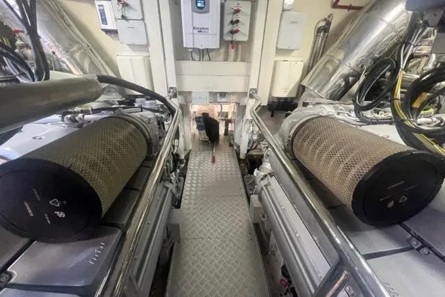  Yacht Photos Pics Engine room of 2009 Overmarine Mangusta 72 HT yacht, showcasing machinery and equipment.