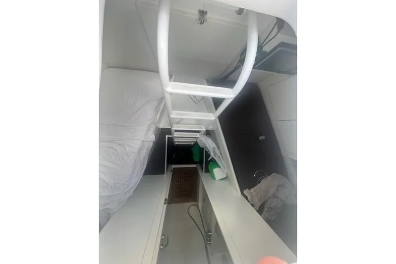  Yacht Photos Pics Interior view of 2009 Overmarine Mangusta 72 HT yacht, featuring a compact cabin space.