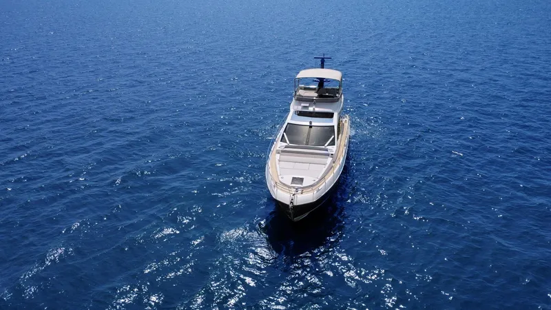  Yacht Photos Pics 2022 Azimut S6 yacht cruising on open blue sea.