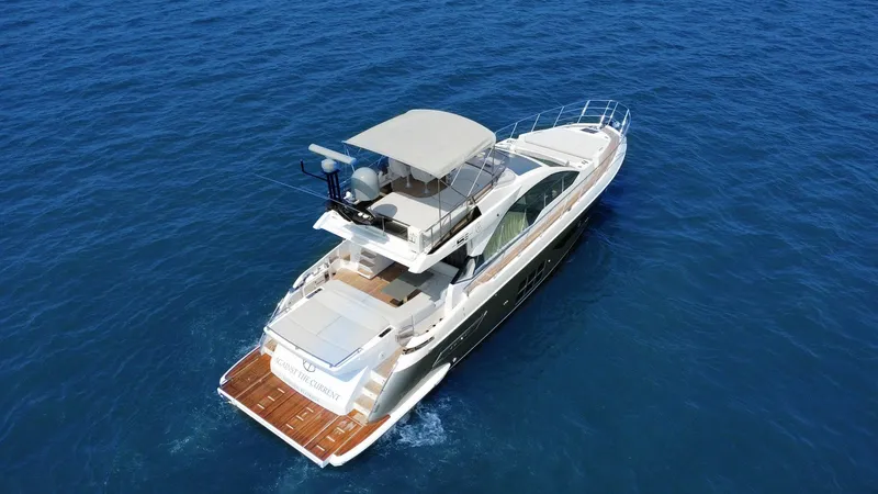  Yacht Photos Pics Luxury 2022 Azimut S6 yacht cruising on open blue sea.
