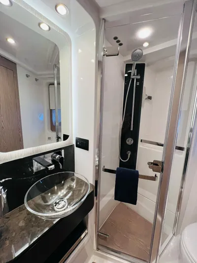  Yacht Photos Pics Luxurious 2022 Azimut S6F yacht bathroom with modern glass shower and sleek sink design.
