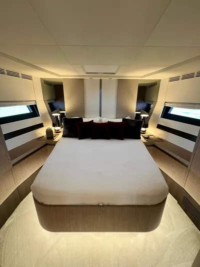  Yacht Photos Pics Luxurious bedroom interior of 2022 Azimut S6F yacht with modern design and ambient lighting.
