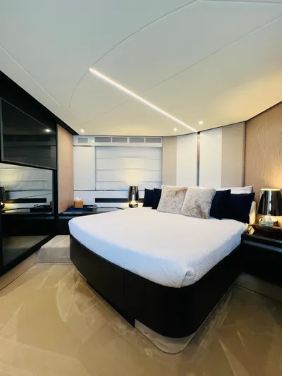  Yacht Photos Pics Luxurious bedroom interior of 2022 Azimut S6F yacht with modern design and elegant furnishings.