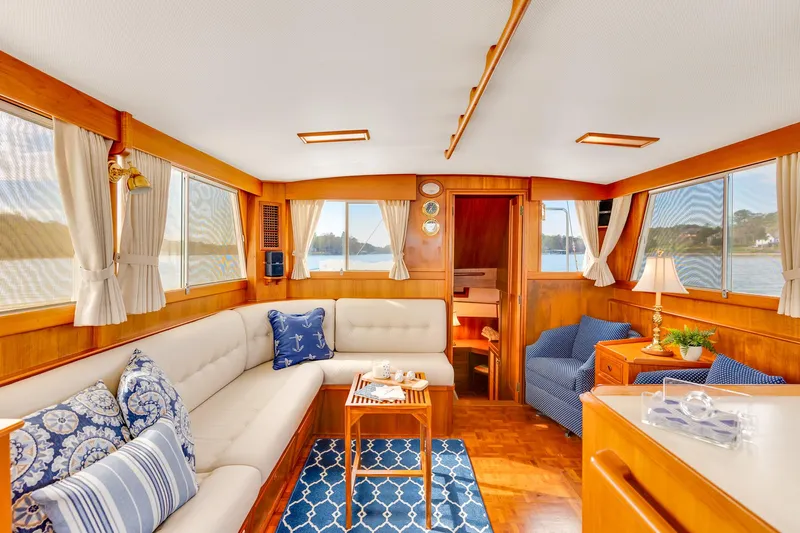 Lu-sea-lu Yacht Photos Pics Luxurious interior of 1994 Grand Banks 42 Classic yacht with elegant furnishings.