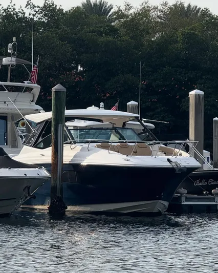  Yacht Photos Pics 2021 Sea Ray Sundancer 320 Coupe OB docked at marina.