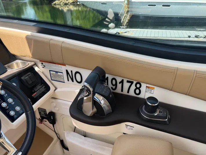  Yacht Photos Pics 2021 Sea Ray Sundancer 320 Coupe Outboard helm with controls and registration number.