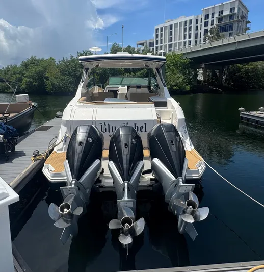  Yacht Photos Pics 2021 Sea Ray Sundancer 320 Coupe Outboard docked with triple engines.