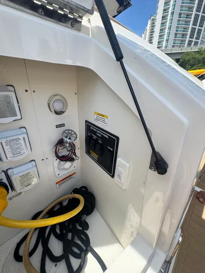  Yacht Photos Pics 2021 Sea Ray Sundancer 320 Coupe Outboard electrical panel with cables and switches.