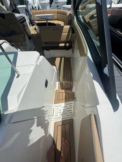  Yacht Photos Pics 2021 Sea Ray Sundancer 320 Coupe Outboard interior with tan seating and teak flooring.