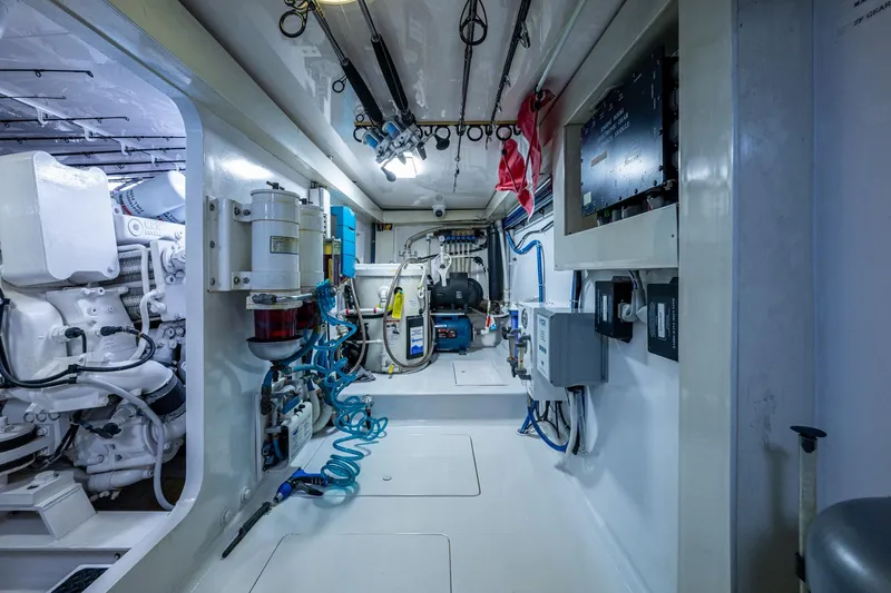 Adrian & Leidiana Yacht Photos Pics Engine room of a 2005 Viking 61 yacht, showcasing equipment and machinery.