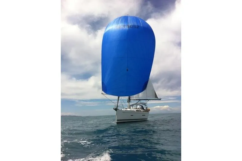 Panopaea Yacht Photos Pics Sailing yacht Dufour 405 GL 2011 with blue spinnaker on open sea.