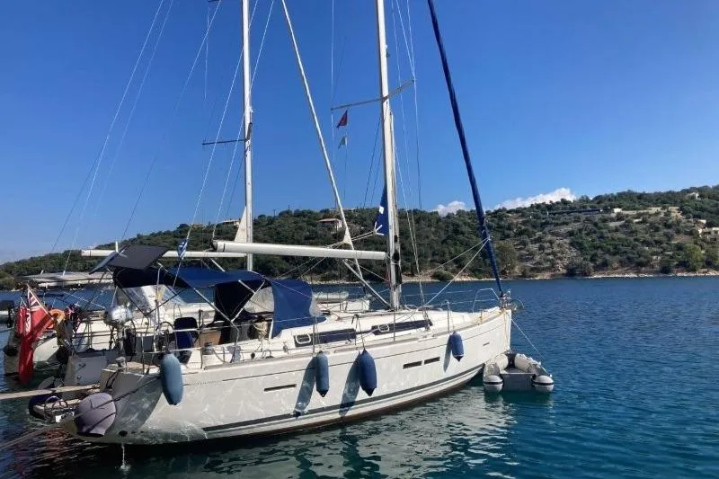 Panopaea Yacht Photos Pics Sailing yacht Dufour 405 GL 2011 docked in scenic coastal waters.