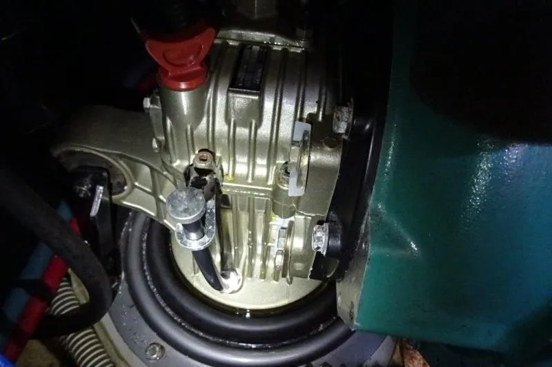 Panopaea Yacht Photos Pics Engine component of a 2011 Dufour 405 GL sailboat, featuring detailed mechanical parts.