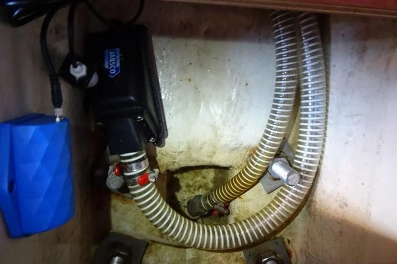 Panopaea Yacht Photos Pics Bilge area of 2011 Dufour 405 GL yacht with hoses and pump system.