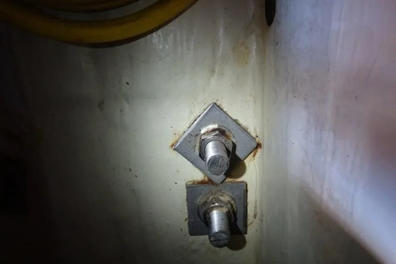 Panopaea Yacht Photos Pics Close-up of bolts on a 2011 Dufour 405 GL yacht interior.