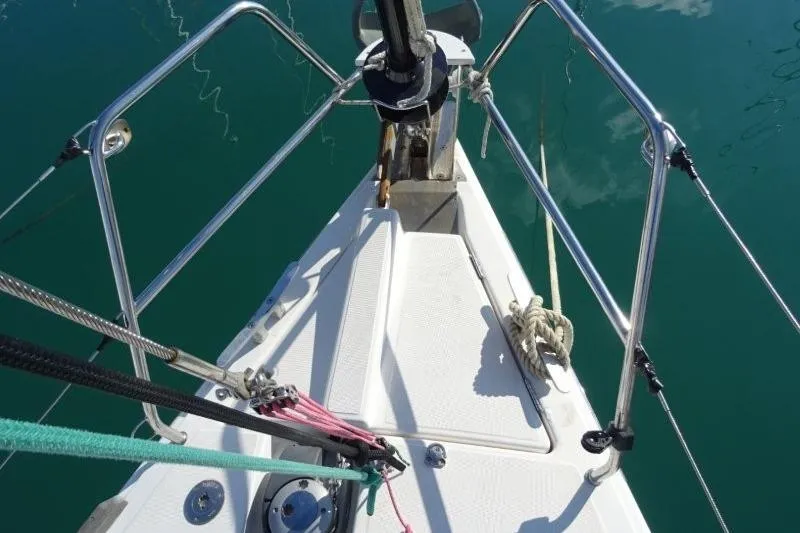 Panopaea Yacht Photos Pics Bow of 2011 Dufour 405 GL sailboat with ropes and railing.