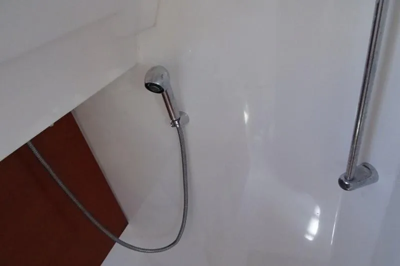 Panopaea Yacht Photos Pics Shower area in 2011 Dufour 405 GL yacht with chrome fixtures.