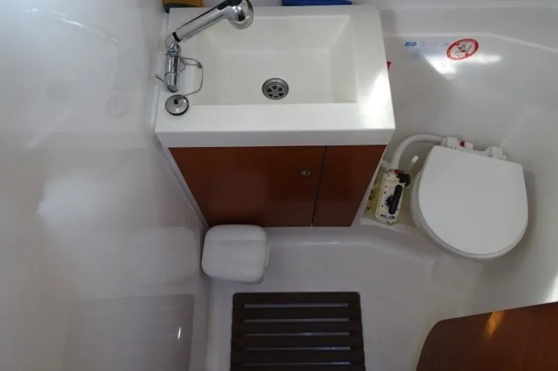 Panopaea Yacht Photos Pics Bathroom interior of 2011 Dufour 405 GL yacht with sink and toilet.