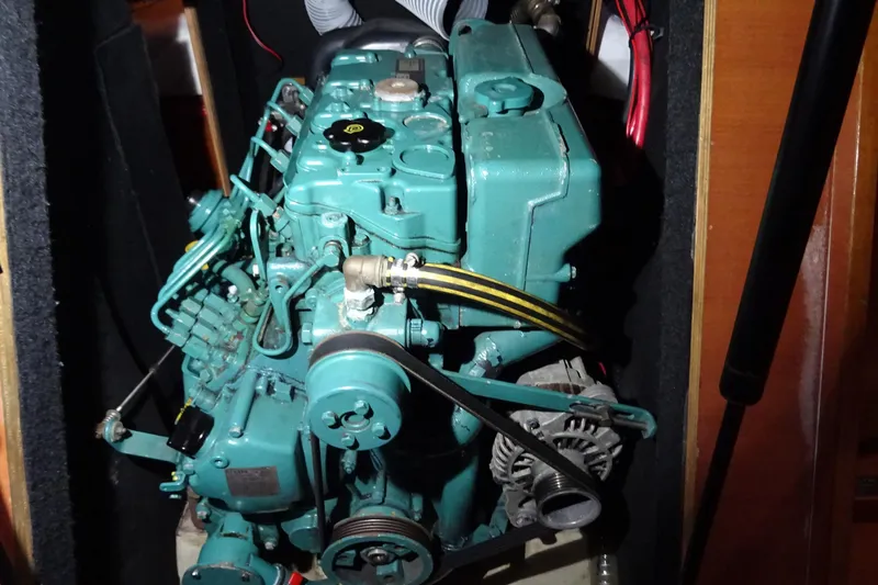 Panopaea Yacht Photos Pics Engine of 2011 Dufour 405 GL sailboat, showcasing mechanical components and belts.