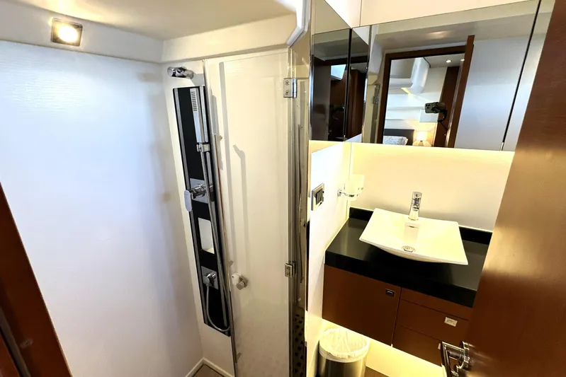 Eribella Yacht Photos Pics Luxurious bathroom in 2016 Prestige 500S yacht with modern shower and sleek sink design.
