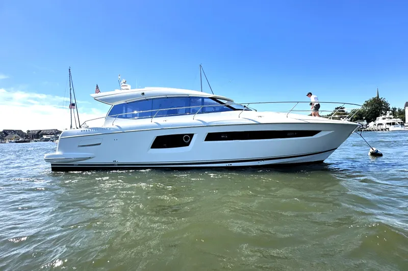 Eribella Yacht Photos Pics 2016 Prestige 500S yacht on water, clear sky, person on deck.