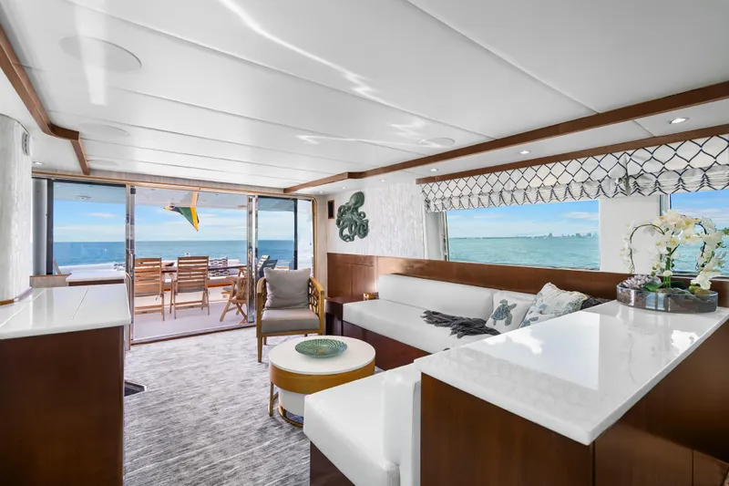 Azure Yacht Photos Pics Luxurious 1991 Maiora flybridge yacht interior with ocean view, elegant seating, and modern decor.