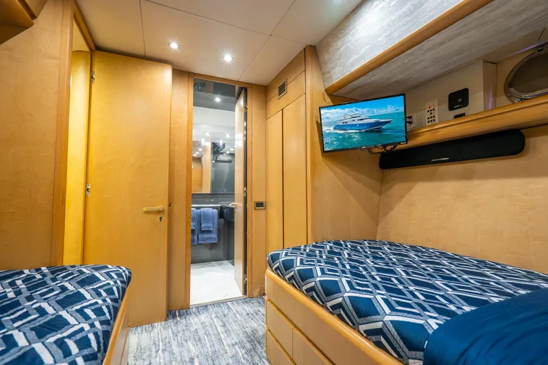 Azure Yacht Photos Pics Luxurious 1991 Maiora flybridge yacht cabin with twin beds and modern amenities.