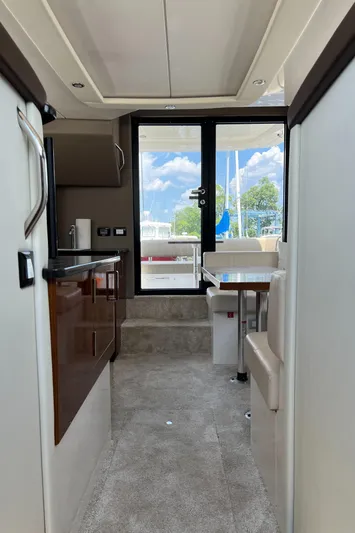 Melody Rose Yacht Photos Pics Interior view of 2016 Carver C34 Command Bridge yacht, featuring modern design and comfortable seating.