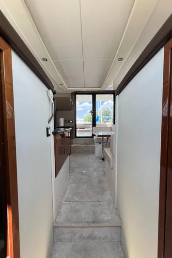 Melody Rose Yacht Photos Pics Interior view of 2016 Carver C34 Command Bridge yacht, featuring modern design and spacious layout.