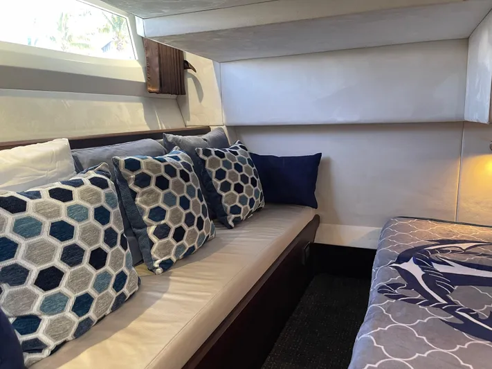 Knot Guilty Yacht Photos Pics Interior of 2016 Galeon 380 Fly yacht with hexagonal patterned cushions.