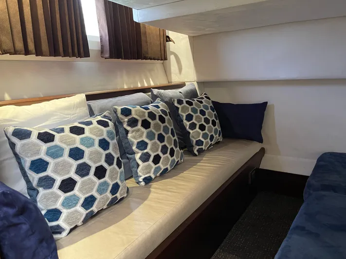 Knot Guilty Yacht Photos Pics Interior of 2016 Galeon 380 Fly yacht with hexagonal patterned cushions.