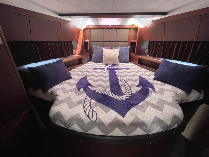 Knot Guilty Yacht Photos Pics Luxurious bedroom in 2016 Galeon 380 Fly yacht with anchor-themed bedding.